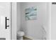 Bathroom with a toilet, a contemporary painting, and a white vanity at 567 Middle Sw St, Atlanta, GA 30310