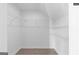 Walk-in closet with white wire shelving and hardwood floors at 567 Middle Sw St, Atlanta, GA 30310