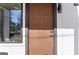 Close up of the front door with a digital lock and modern design at 567 Middle Sw St, Atlanta, GA 30310