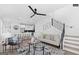 Open-concept living room with modern furnishings, stylish decor, and a view of the kitchen at 567 Middle Sw St, Atlanta, GA 30310