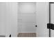 Bright walk-in closet with wire shelving and modern flooring at 567 Middle Sw St, Atlanta, GA 30310