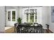 Bright dining room with a dark wood table, modern chandelier, and ample natural light at 0 Lot 2 Mcbride Rd, Fayetteville, GA 30215