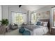Tranquil bedroom with a large window, neutral color palette, and seating area at 0 Lot 2 Mcbride Rd, Fayetteville, GA 30215