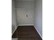 Convenient laundry room area with shelving, electrical outlets, and hookups at 263 Rocky Point Rd, Covington, GA 30014