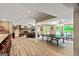 Finished basement featuring a fireplace, wet bar, ping pong table, and walkout to the pool at 709 Prestige Pt, Peachtree City, GA 30269