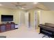 Large bonus room with an entertainment system and a piano at 709 Prestige Pt, Peachtree City, GA 30269