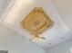Detailed ceiling with decorative art and ceiling fan at 709 Prestige Pt, Peachtree City, GA 30269