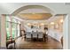 Dining room with chandelier and large windows at 709 Prestige Pt, Peachtree City, GA 30269