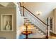Classic foyer with hardwood floors and a staircase at 709 Prestige Pt, Peachtree City, GA 30269