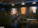 Comfortable seating is the highlight of this cozy home theater complete with movie posters at 709 Prestige Pt, Peachtree City, GA 30269