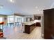 Spacious kitchen and recreation room offers ample counter space, seating, and stainless steel appliances at 709 Prestige Pt, Peachtree City, GA 30269