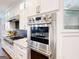 Close-up view of a stainless steel oven in a modern kitchen setting at 709 Prestige Pt, Peachtree City, GA 30269