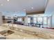 The living room offers a stone fireplace, media center, and leads to a recreation and outdoor area at 709 Prestige Pt, Peachtree City, GA 30269