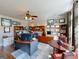 Home office with built-in shelving, desk space, and natural light at 709 Prestige Pt, Peachtree City, GA 30269