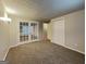 Neutral bedroom featuring carpet floors, closet and French doors leading into another room at 284 High Meadow Dr, Marietta, GA 30068