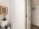 Bathroom with a toilet and a door leading to a closet at 3623 Meadow Glen Cir, Ellenwood, GA 30294