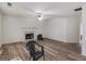 View of the living room featuring a fireplace, and wood-look flooring at 3623 Meadow Glen Cir, Ellenwood, GA 30294