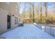 The house back deck, covered with a layer of fresh snow at 3049 Flat Shoals Rd, Atlanta, GA 30349
