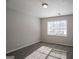 Neutral bedroom filled with natural light from the bright window and featuring carpeted floors at 3049 Flat Shoals Rd, Atlanta, GA 30349