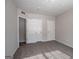 Cozy bedroom with carpet flooring, closet, neutral paint, and bright natural light at 3049 Flat Shoals Rd, Atlanta, GA 30349