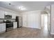 Modern kitchen with stainless steel appliances, granite counters, and ample cabinet space at 3049 Flat Shoals Rd, Atlanta, GA 30349