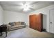 Bright living room with neutral carpeting, ceiling fan, and ample space for relaxation at 2854 Botany Dr, Jonesboro, GA 30236