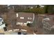 Charming two-story house with a brown roof, surrounded by mature trees and a well-maintained front yard at 2683 Mariner Way, Villa Rica, GA 30180