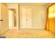 Bedroom featuring neutral carpet, a double closet door, and neutral-colored walls at 2683 Mariner Way, Villa Rica, GA 30180