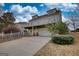 Features a two-story home with a spacious garage and second-floor deck, complemented by mature landscaping at 2683 Mariner Way, Villa Rica, GA 30180