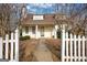 Charming two-story home with a welcoming front porch and manicured landscaping at 2683 Mariner Way, Villa Rica, GA 30180