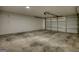 Spacious two car garage with concrete flooring and automatic door at 2683 Mariner Way, Villa Rica, GA 30180