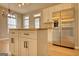Bright kitchen features stainless steel appliances, a large island, and ample counter space at 2683 Mariner Way, Villa Rica, GA 30180