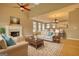 Bright living room features a fireplace, hardwood floors and stylish, comfortable furnishings at 2683 Mariner Way, Villa Rica, GA 30180