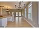 Spacious living room with hardwood floors, fireplace, and lots of natural light at 2683 Mariner Way, Villa Rica, GA 30180