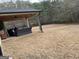 View of covered patio with ceiling fan, outdoor furniture and large backyard at 2102 Braswell Ln, Loganville, GA 30052