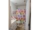 Bathroom featuring a shower/tub, playful decor, and a vanity at 2764 Keystone Ave, Lithonia, GA 30058