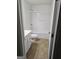 This bathroom has a vanity with white cabinets, a toilet, and a shower-tub combo at 2764 Keystone Ave, Lithonia, GA 30058