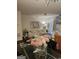 Open-concept living space with comfortable seating, stylish décor, and a view into the kitchen for easy entertaining at 2764 Keystone Ave, Lithonia, GA 30058