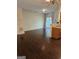 Bright living room with hardwood floors and sliding glass doors leading to the outside at 2764 Keystone Ave, Lithonia, GA 30058