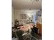 Open-concept living space with comfortable seating, stylish décor, and a view into the kitchen for easy entertaining at 2764 Keystone Ave, Lithonia, GA 30058