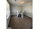 Formal dining room with a modern table set and natural light from a large window at 2986 Cascade Manor Dr, Decatur, GA 30034