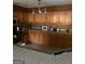 Well-lit kitchen with granite countertops, stainless steel microwave, and abundant cabinet space at 5620 Sable Way, Atlanta, GA 30349