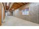 Unfinished basement featuring a large window allowing natural light and providing ventilation at 787 N Ola Rd, Mcdonough, GA 30252