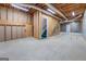 Unfinished basement with exposed ceiling and walls offers potential for customization and expansion at 787 N Ola Rd, Mcdonough, GA 30252