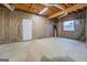 Unfinished basement area with door to the outside offering a blank canvas to personalize at 787 N Ola Rd, Mcdonough, GA 30252