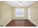 Bedroom featuring hardwood floors and a ceiling fan at 11531 E Lovejoy Rd, Hampton, GA 30228