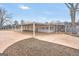 Expansive metal building with a large carport featuring ceiling fans for air circulation, surrounded by a spacious concrete lot at 11531 E Lovejoy Rd, Hampton, GA 30228