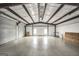 Vast warehouse space features a high ceiling, well lit with natural light, and concrete flooring at 11531 E Lovejoy Rd, Hampton, GA 30228