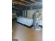 Unfinished basement with block foundation, plumbing, and utility equipment at 392 Carey Se Dr, Atlanta, GA 30315