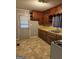 Functional kitchen featuring wood cabinets and white appliances, ready for customization at 392 Carey Se Dr, Atlanta, GA 30315